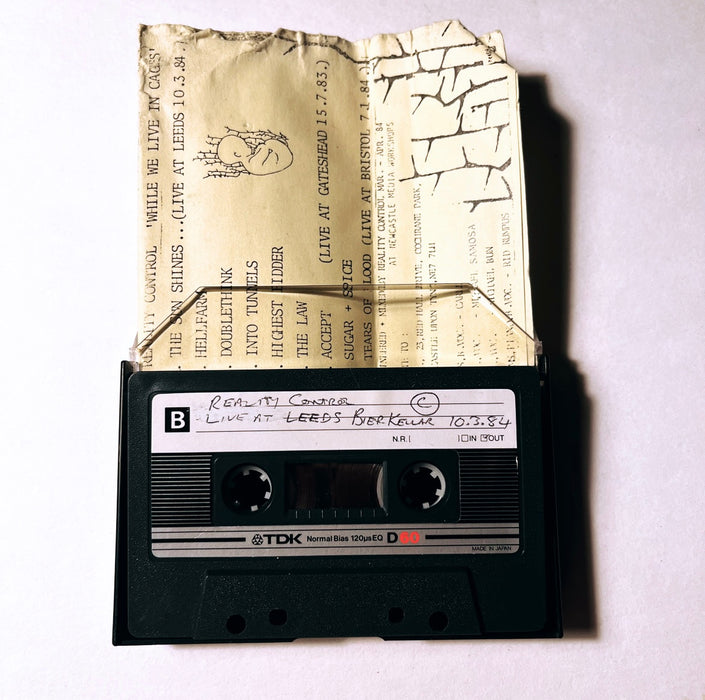 While We Live In Cages (UK DEMO Tape)